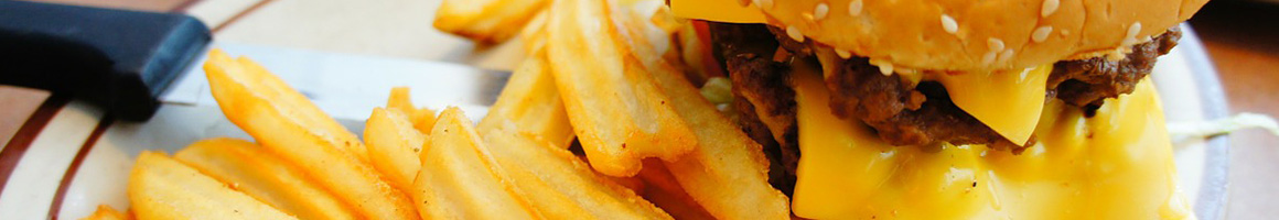 Eating Burger Fast Food at Cloud 9 Burgers restaurant in Bellevue, WA.
